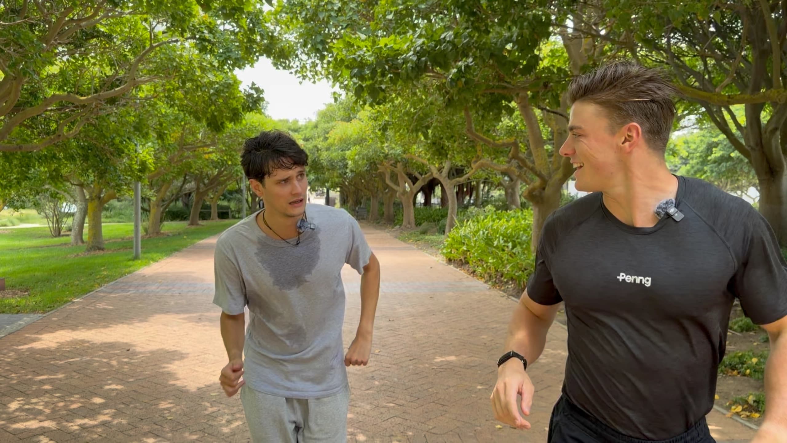 Two runners wearing Penng bands